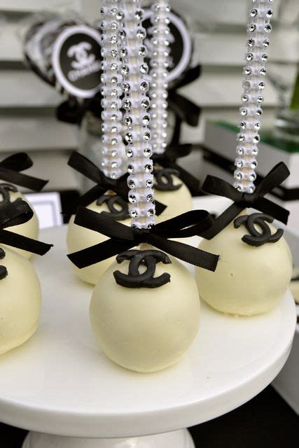 black and white chanel cake pops|Chanel birthday cake.